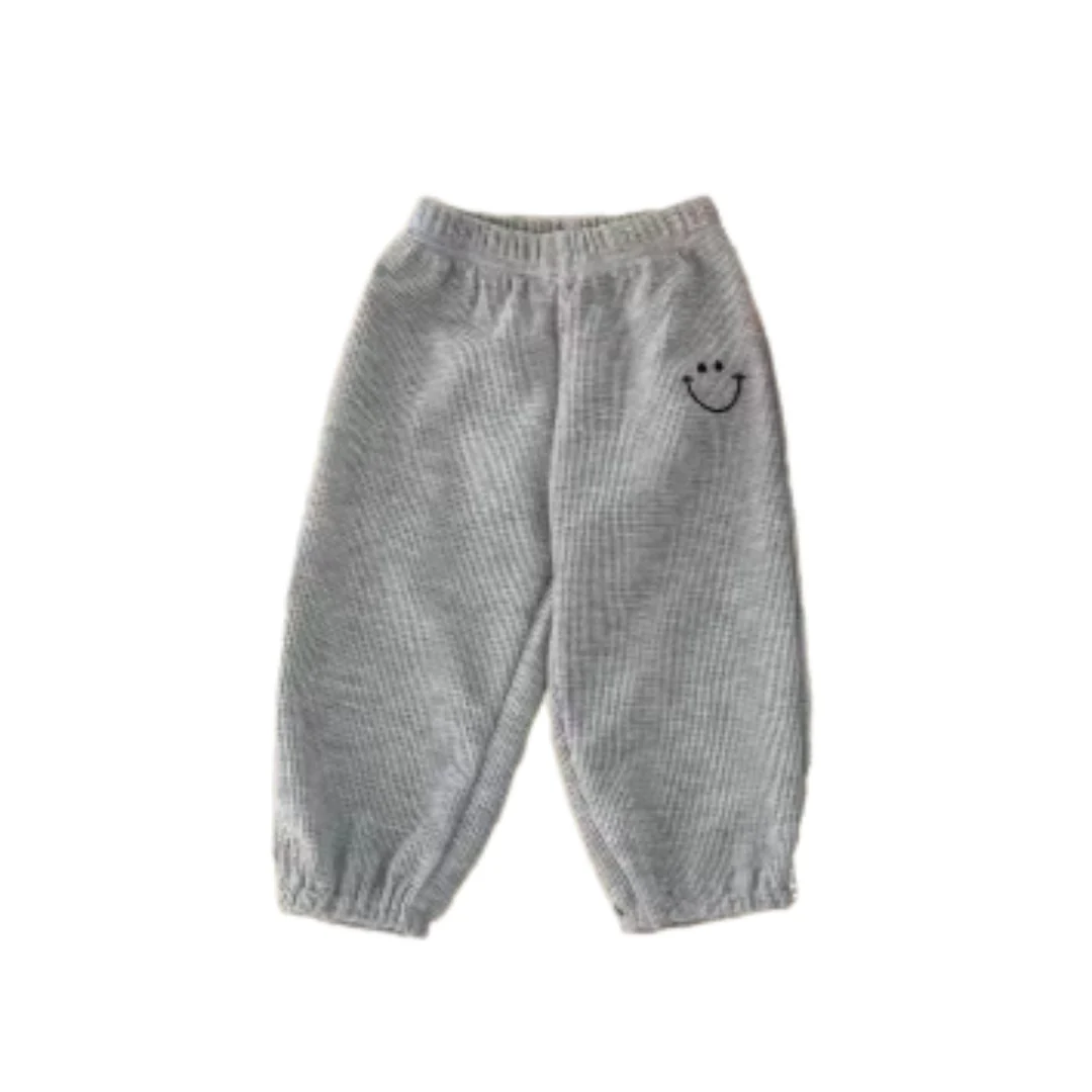 Happy Waffle Trackies | Grey